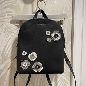 Embroidered lightly used Michael Kors backpack